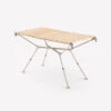 Quechua TABLE DE CAMPING COMPACTE 4/6 PERSONNES - PLATEAU BOIS - POCHE DE RANGEMENT 2 Quechua TABLE DE CAMPING COMPACTE 4/6 PERSONNES - PLATEAU BOIS - POCHE DE RANGEMENT -Plein Air Équipement Magasin table de camping compacte 46 personnes plateau bois poche de rangement